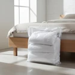 Bellatex Úložný obal na lůžkoviny a deky 55×60×10 cm – taška se zipem a textilním uchem, průhledný, bílý lem
